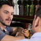 Image for article titled Man Looks On Helplessly As Friend Tells Him Story He’s Already Heard